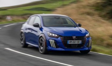 Peugeot-e-208-GTi-la-prova-su-strada-scaled-370x220.jpg